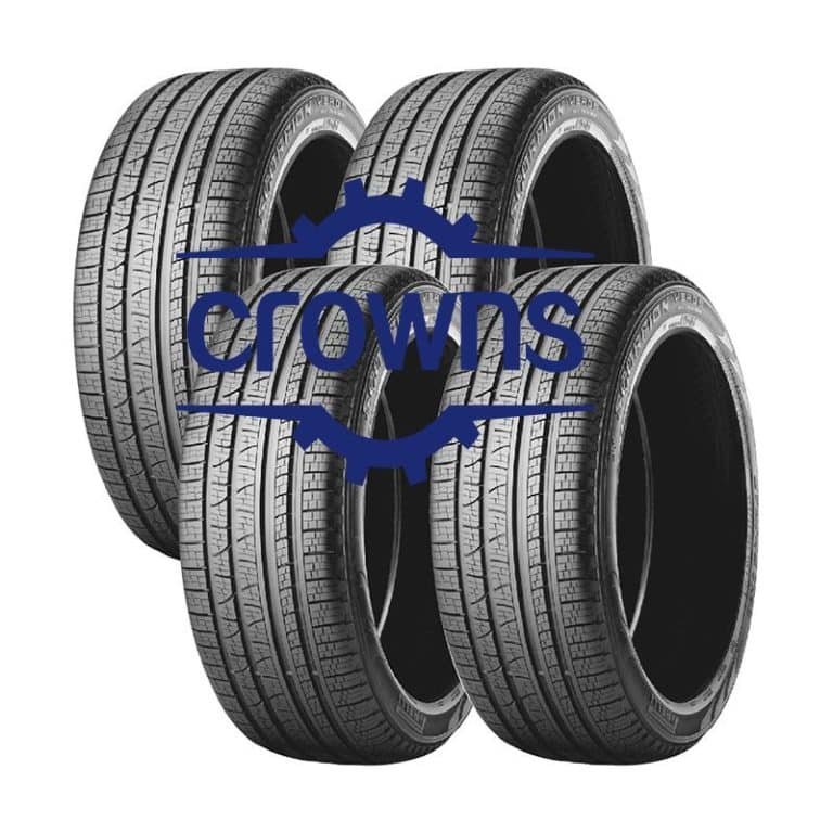 Multiple passenger car tires stacked together showcasing symmetrical tread design.