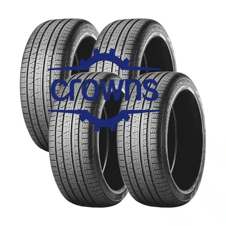 Multiple passenger car tires stacked together showcasing symmetrical tread design.
