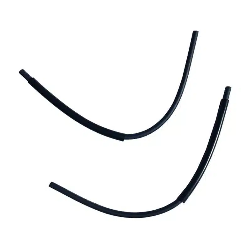 Curved black rubber hoses produced using extrusion technology for a variety of industrial applications